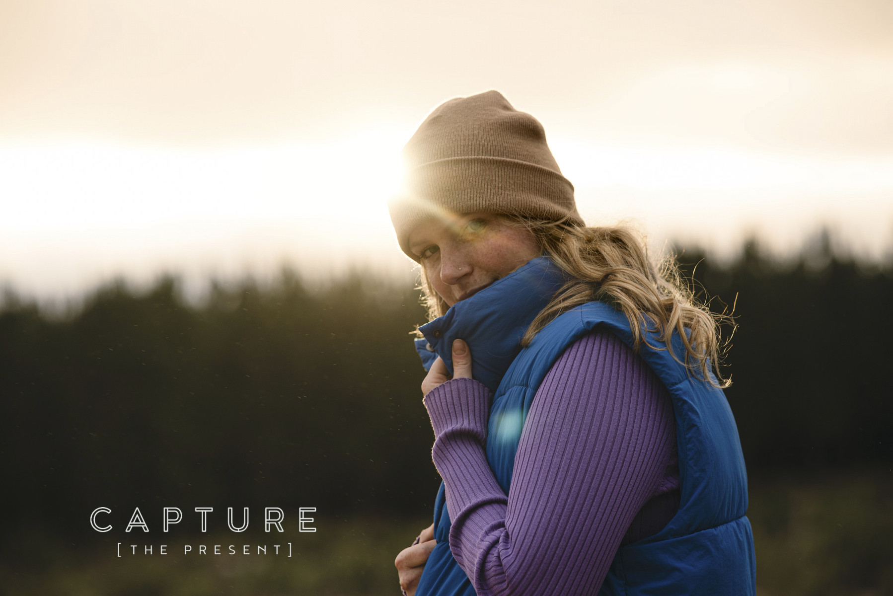 Adelaide actor Nicola in a beanie at sunset in a Mount Gambier forest