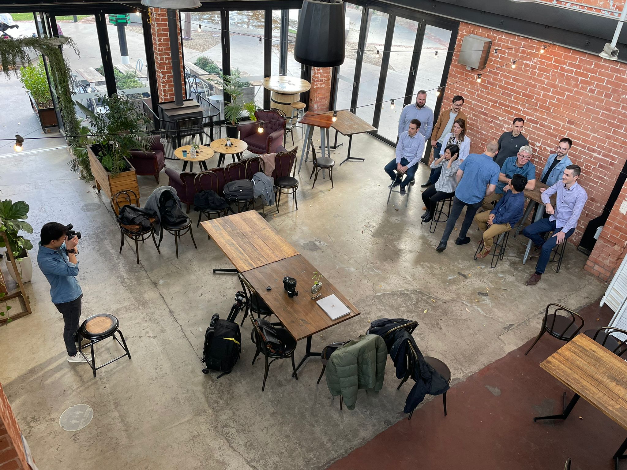 Behind the scenes of a team photoshoot with Argon Design in a café