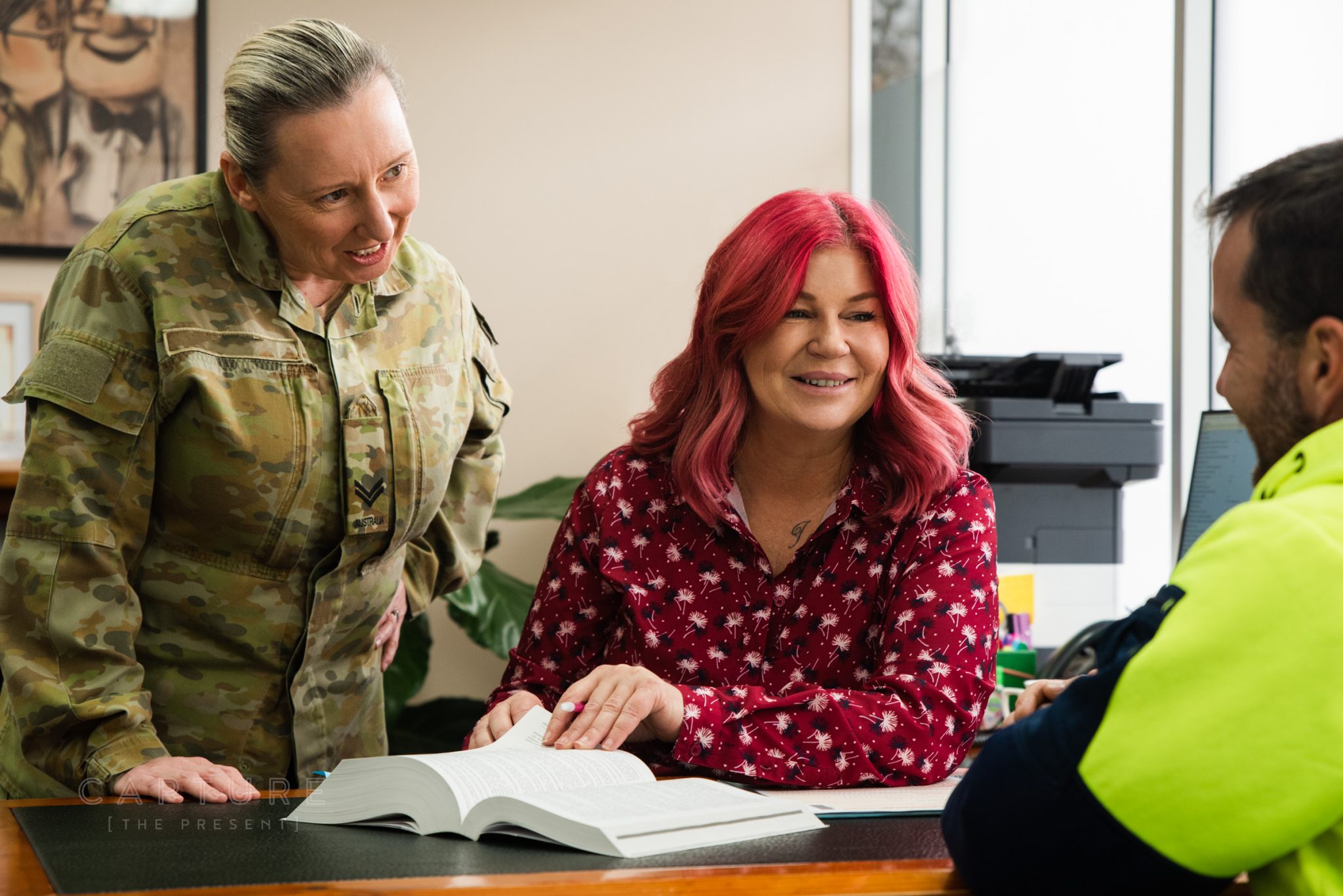 DMC Tax director Danie meeting a defence force client at the Mawson Lakes office