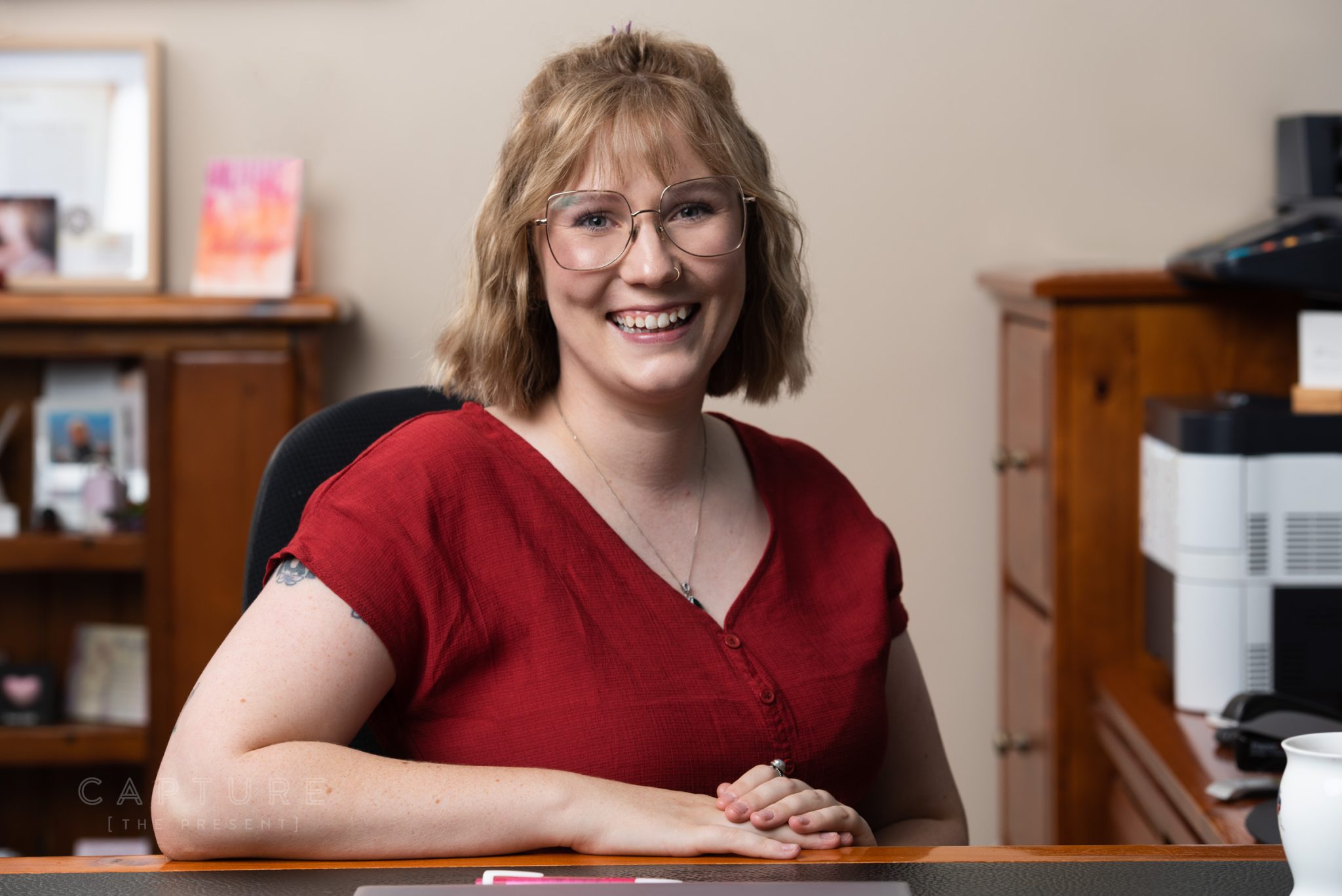 Portrait of a DMC Tax staff member at her desk in the Mawson Lakes office
