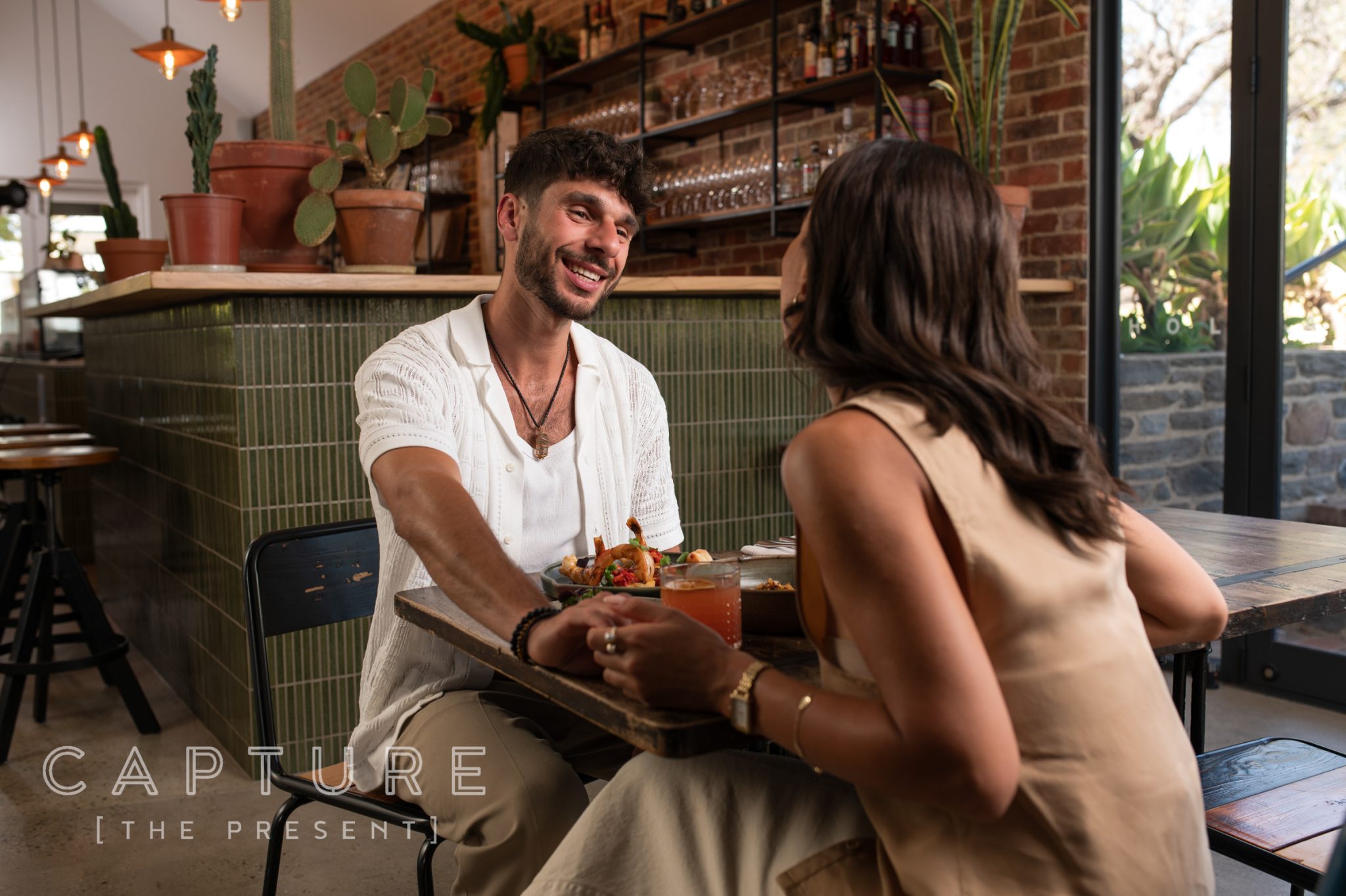 Couple sharing lunch at a Barossa Valley restaurant table