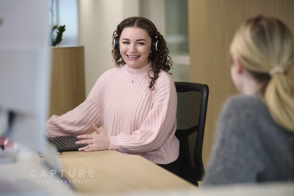 Commercial and brand photography of receptionist at accounting firm