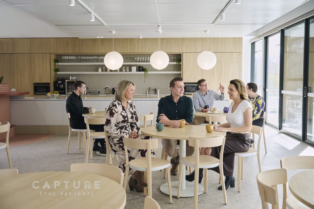 Wide shot of staff members in Adelaide accounting firm by commercial photographer