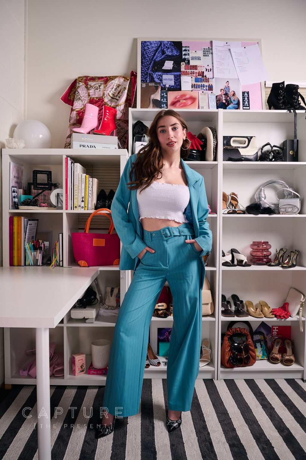 Full length portrait in blue jumpsuit on stylist